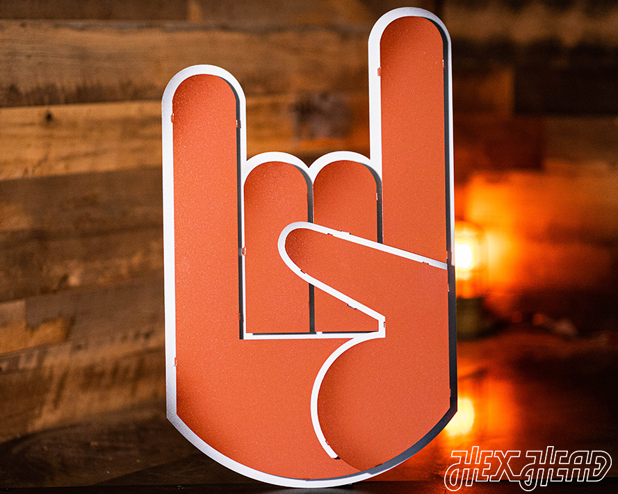 Hook'em, Horns.' The origin story of Texas Longhorns hand signal.