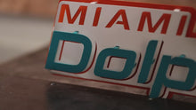 Load and play video in Gallery viewer, Miami Dolphins Wordmark 3D Vintage Metal Wall Art
